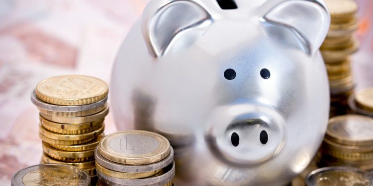 Coins and a piggy bank