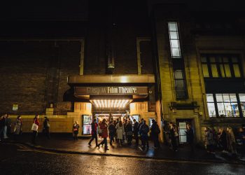 Entrance of Glasgow Film Theatre with people attending its 25th festival