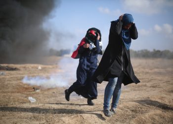 Gaza with people running