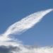 A photo of a cloud shaped like a quill to inspire writing