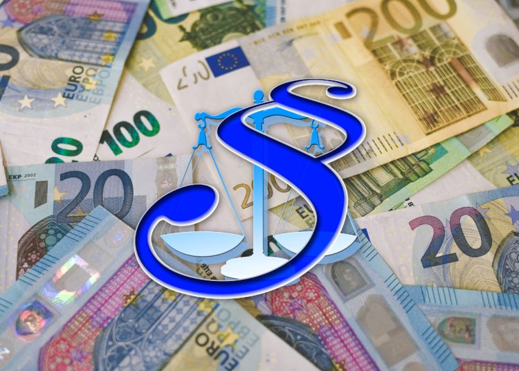 Euro notes with a law symbol representing fiscal rules