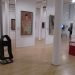 A photo from inside Kirkcudbright Galleries displaying works by William Gillies