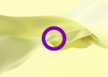 A soft yellow material flowing by the wind with the a purple circle representing intersex pride flag