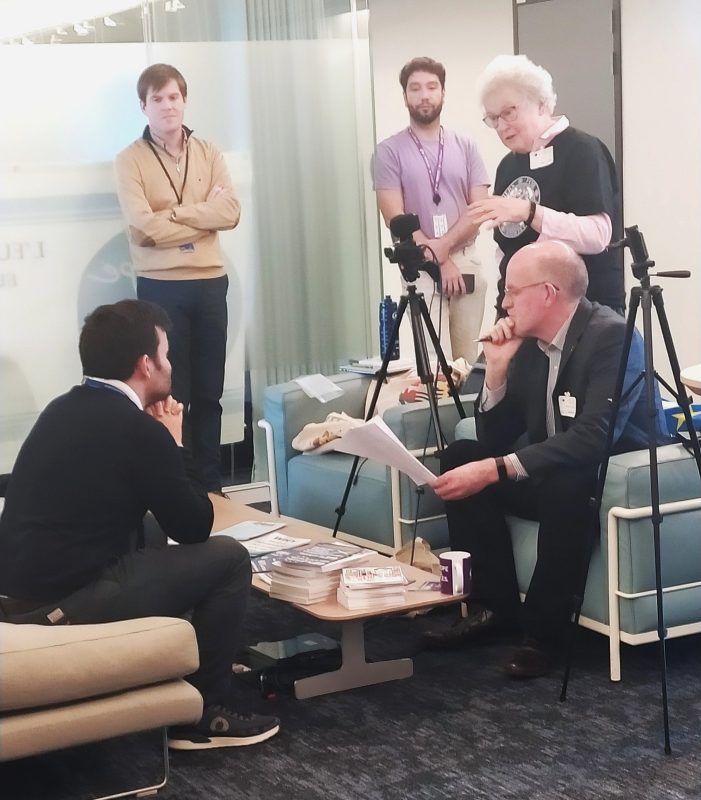 A photo of the Scottish Indy podcasters in discussion at the European Parliament