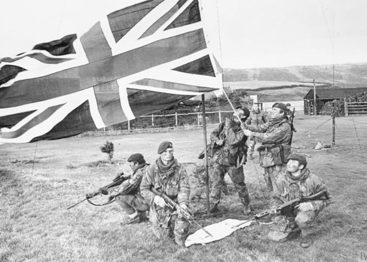 British army forces representing neoliberalism with violence